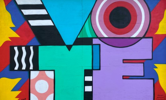 Das Wort &quotVote&quot ist als Graffiti auf eine Wand gesprüht.